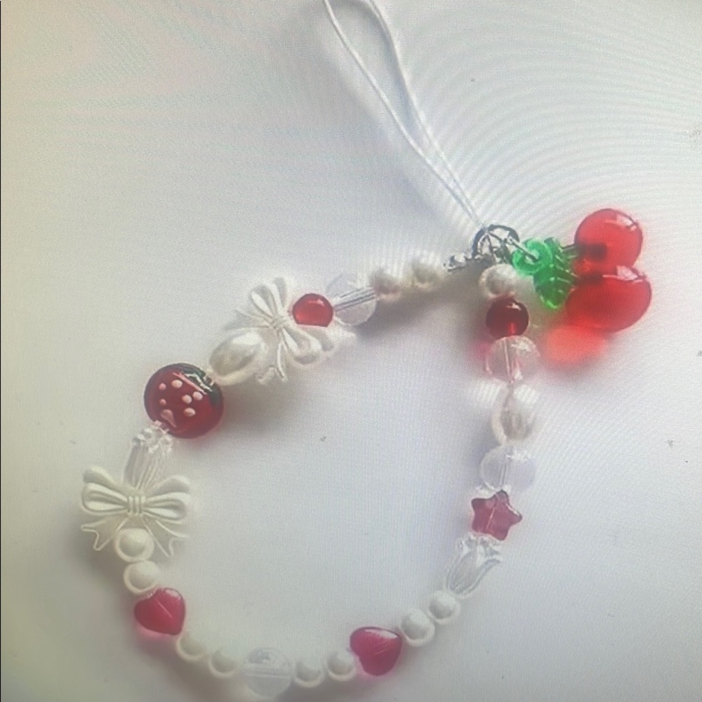 Red and White Beaded Phone Case Accessory